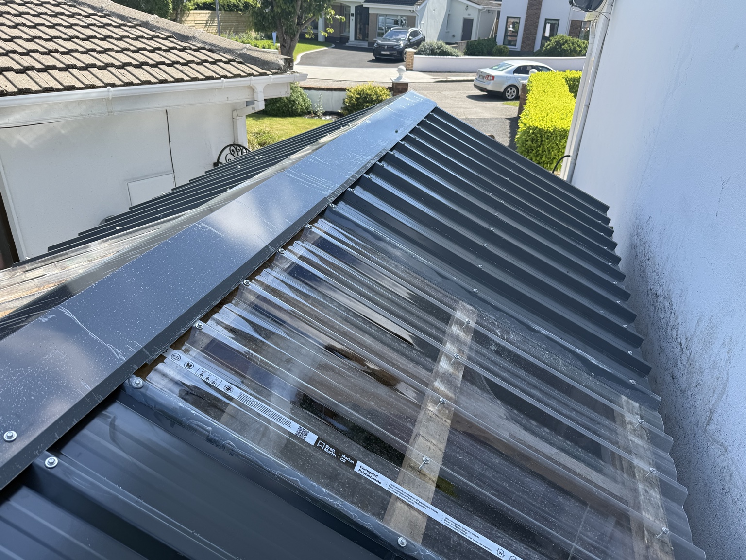 Corrugated metal roof finish