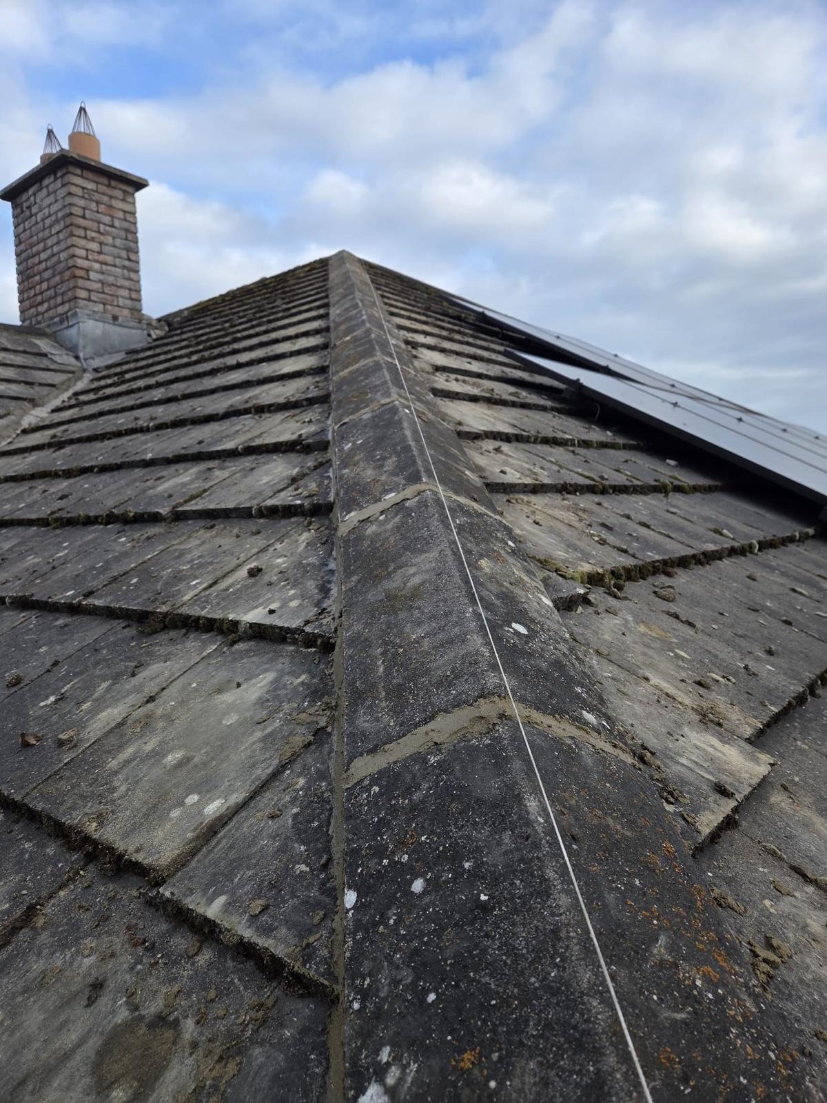 Existing slate roof and ridge detail